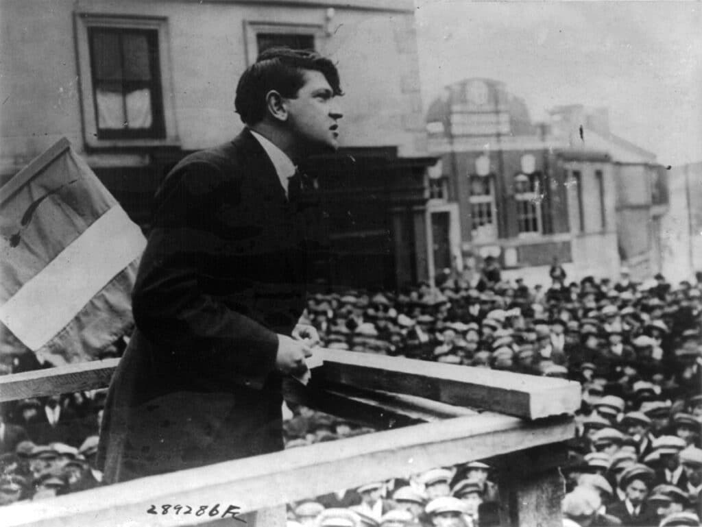 Michael Collins, speaking in public. He is one of Ireland's most significant figures. 